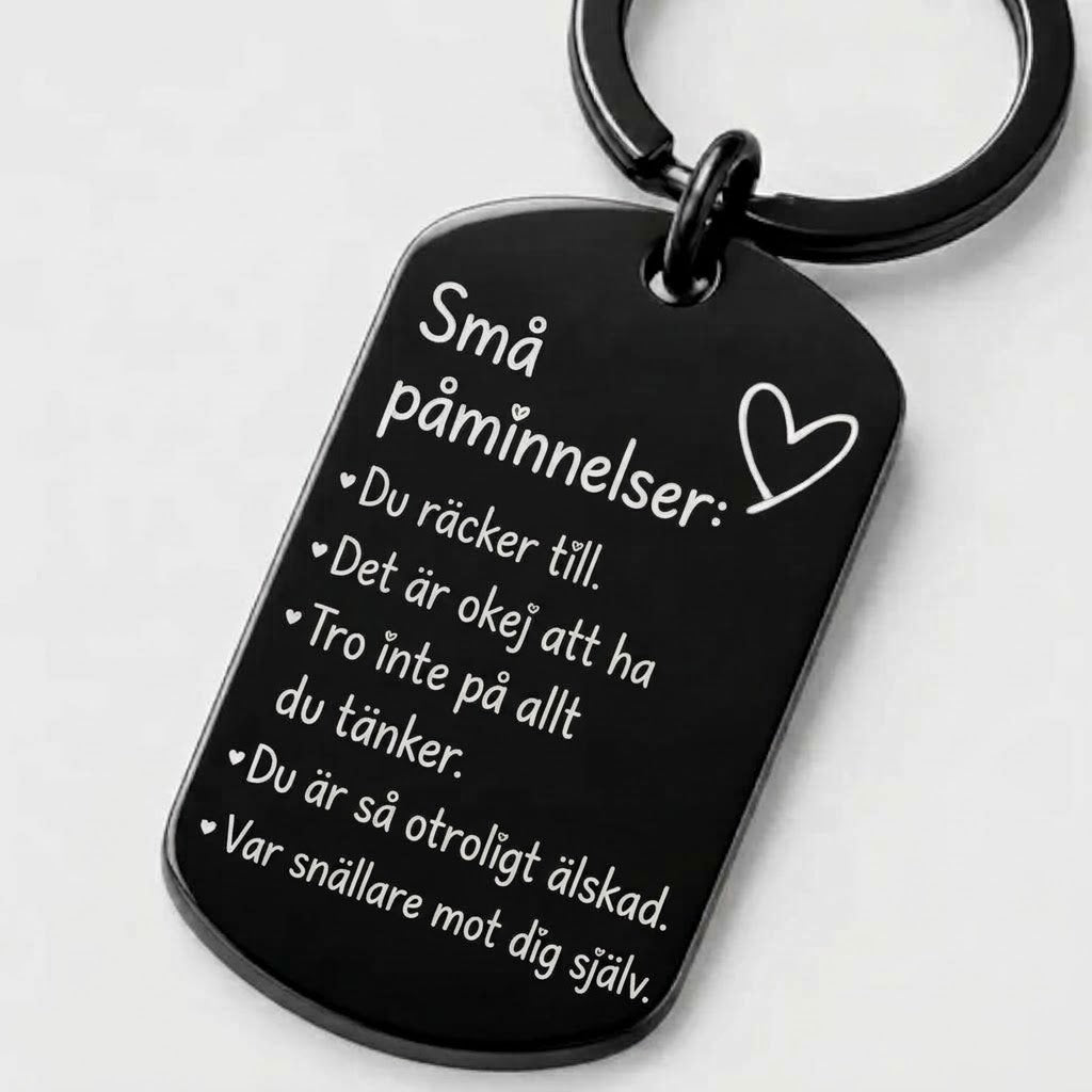 Inspirerande nyckelring med graverad text